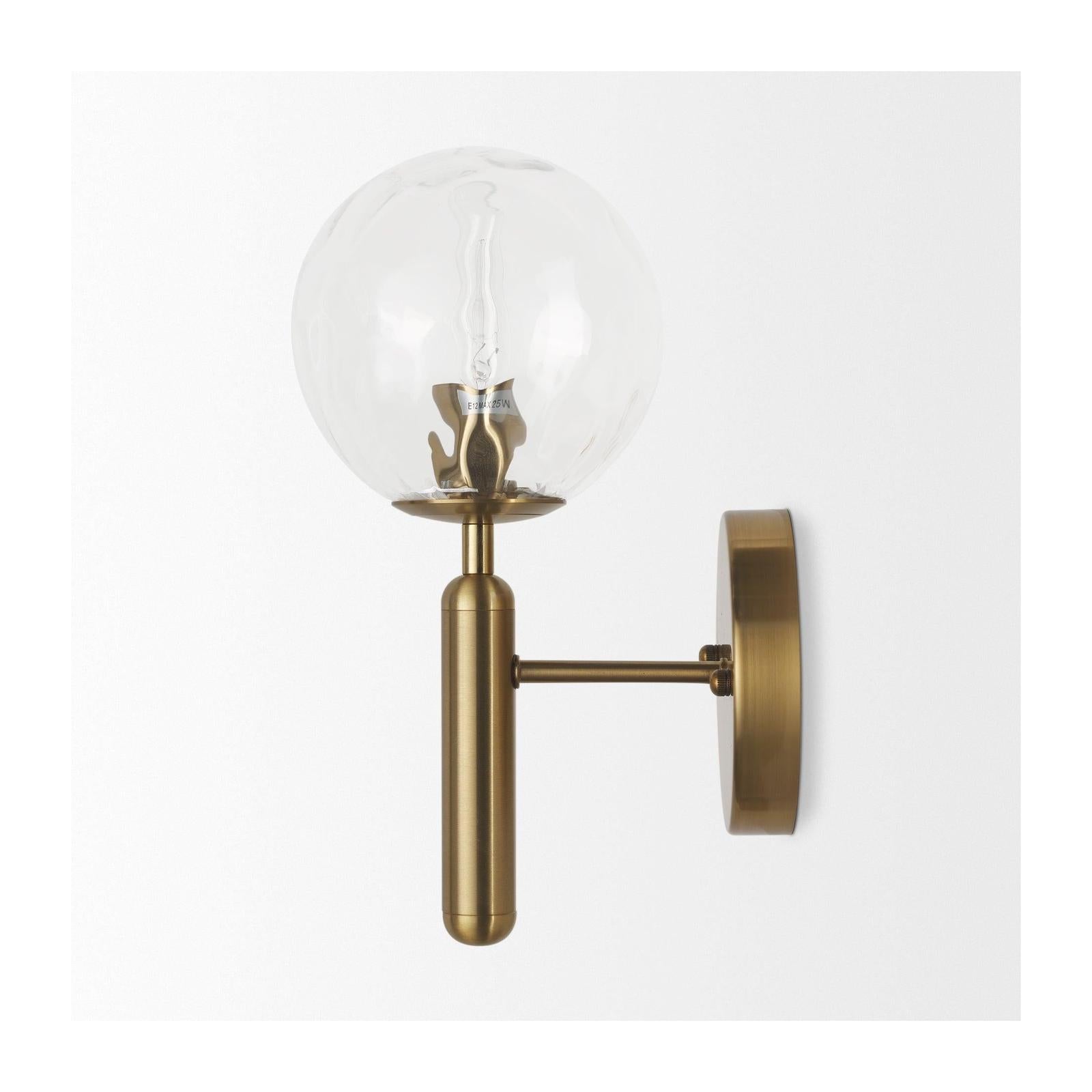 Mercana Britton Gold Metal w/ Clear Glass Globe 1-Light Wall Sconce Clearance