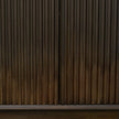 Mercana Cinder Distressed Dark Brown Wood Reeded 4-Door Closed Sideboard