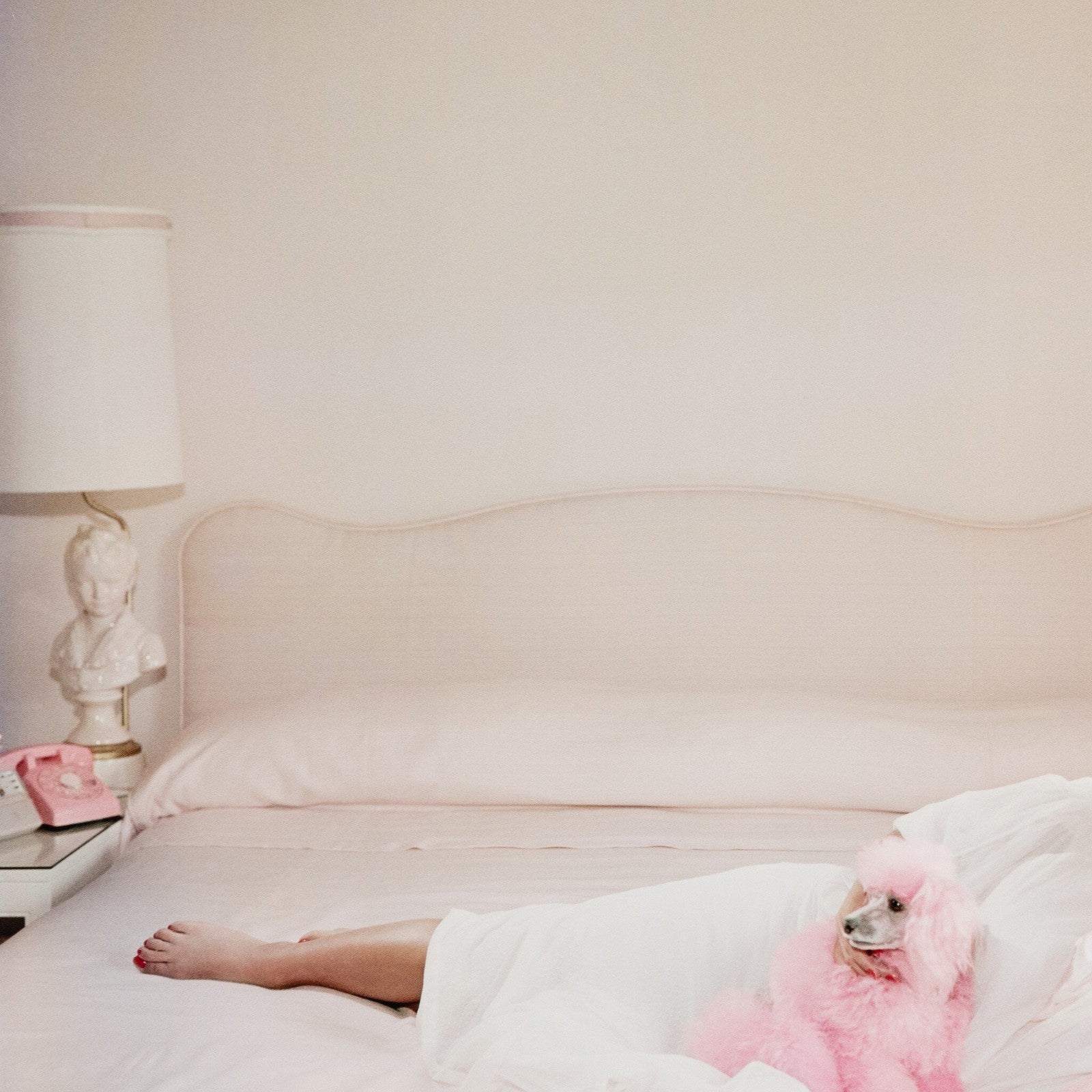 Joan Collins Relaxes By Slim Aarons