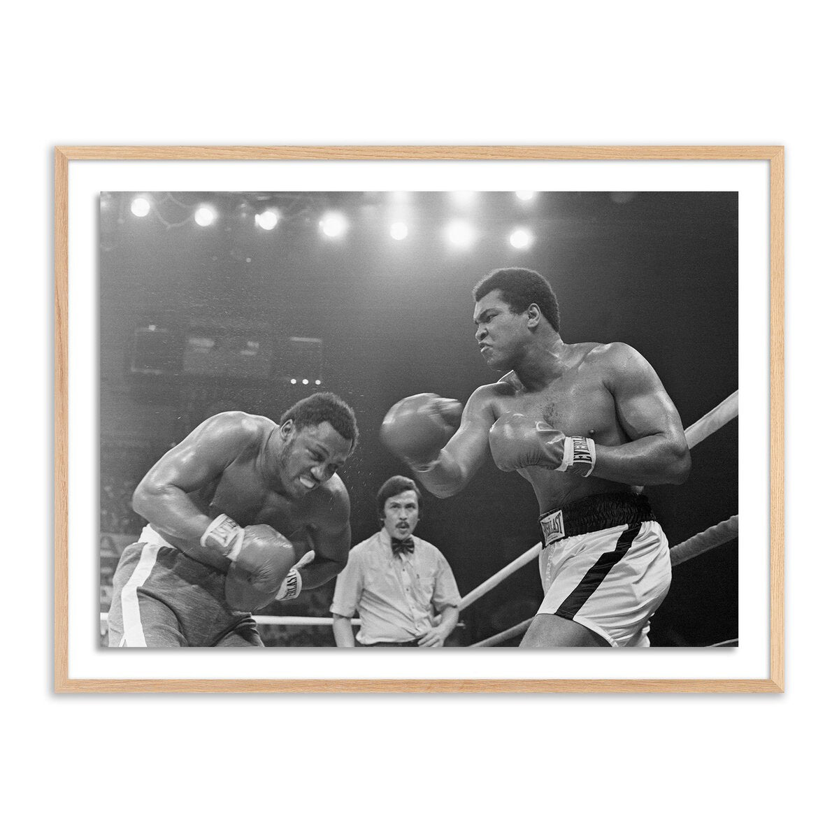 Muhammad Ali Punching Joe Frazier By Getty Images