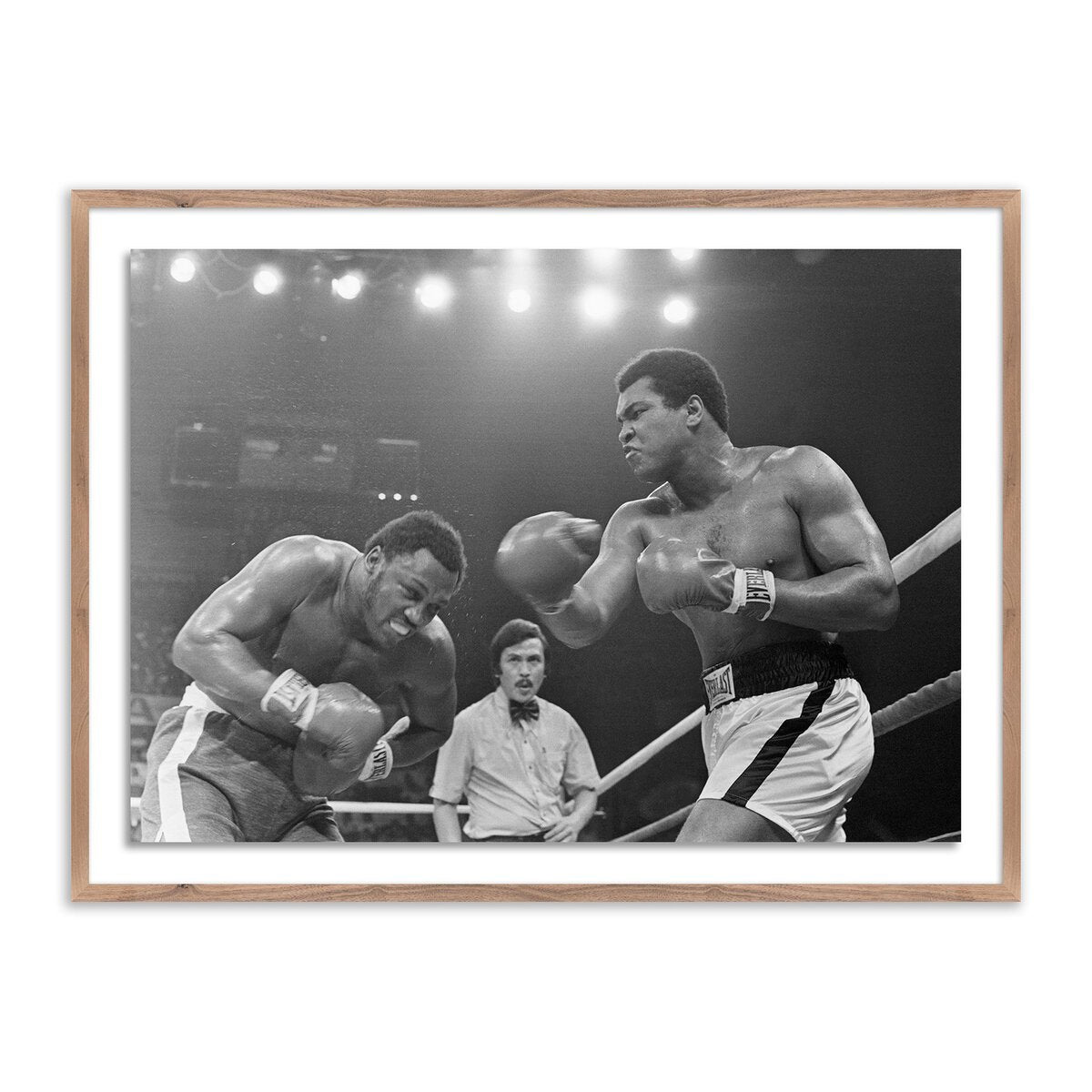 Muhammad Ali Punching Joe Frazier By Getty Images