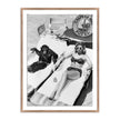 Woman Sunbathing With Chimpanzee By Getty Images