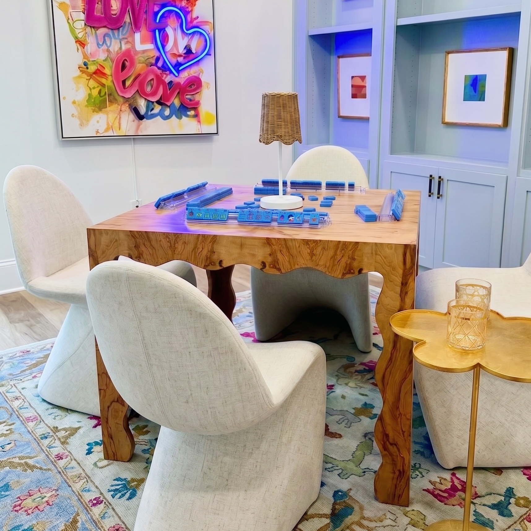 Game room with wooden table, chairs, and colorful decor
