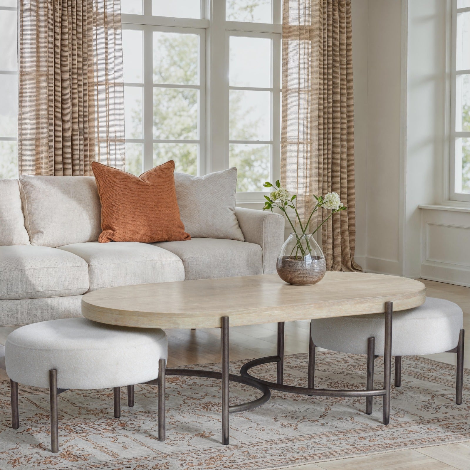 Magnussen Home Jennings Edgecomb Grey And Weathered Antique Nickel Oval Cocktail Table With 2 Ottomans