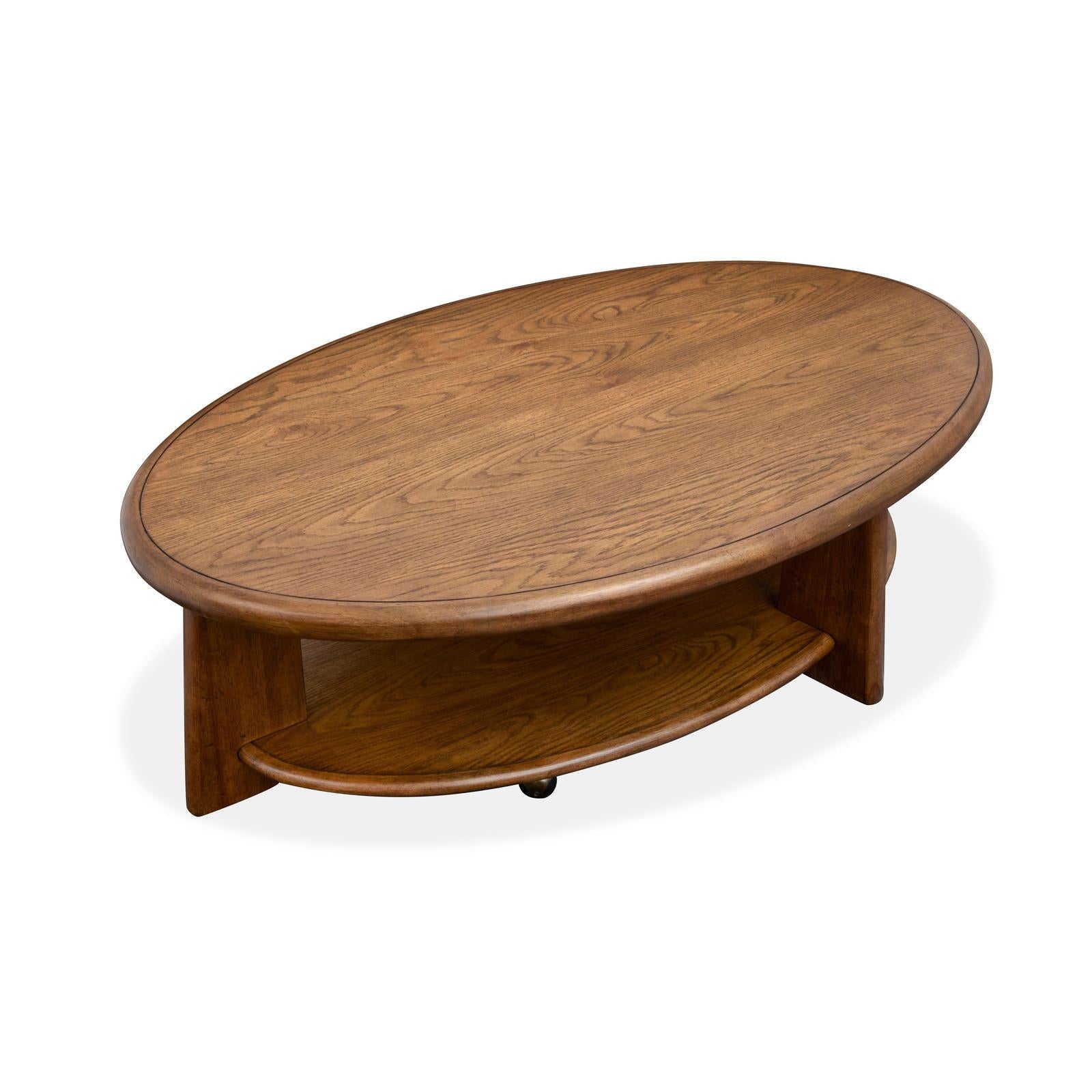 Magnussen Home Tanner Tawny Brown Oval Cocktail Table With Casters