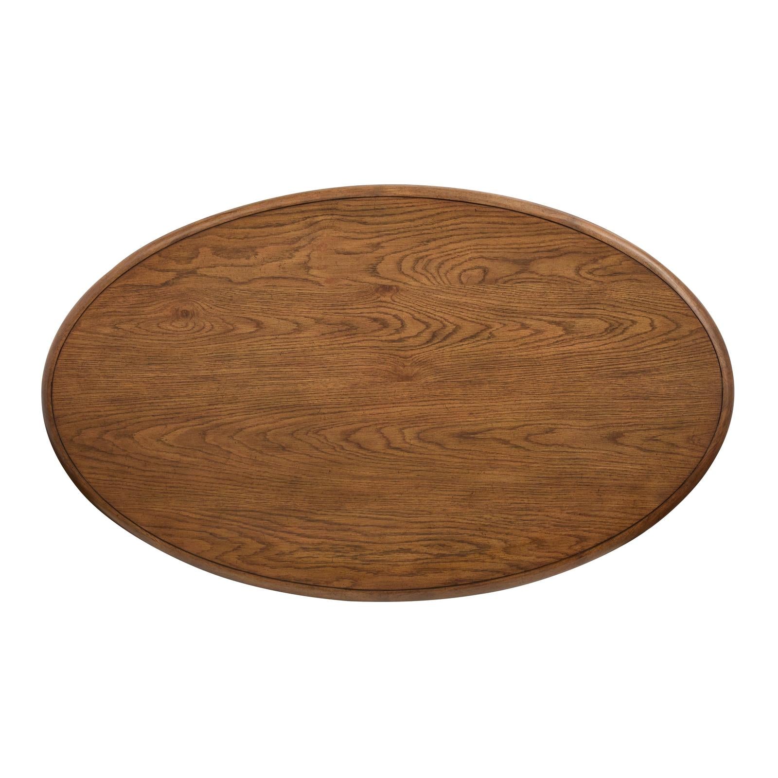 Magnussen Home Tanner Tawny Brown Oval Cocktail Table With Casters