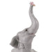 Lladro Baby Elephant with Pink Flower Figurine